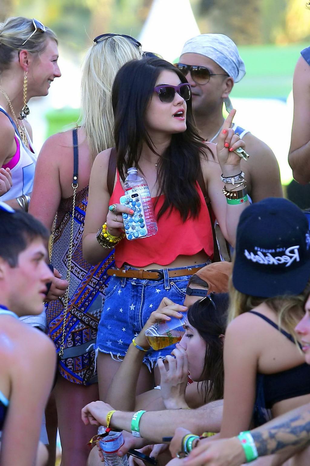 16P Lucy Hale wearing tiny red belly top and denim shorts at 2013 Coachella Music an