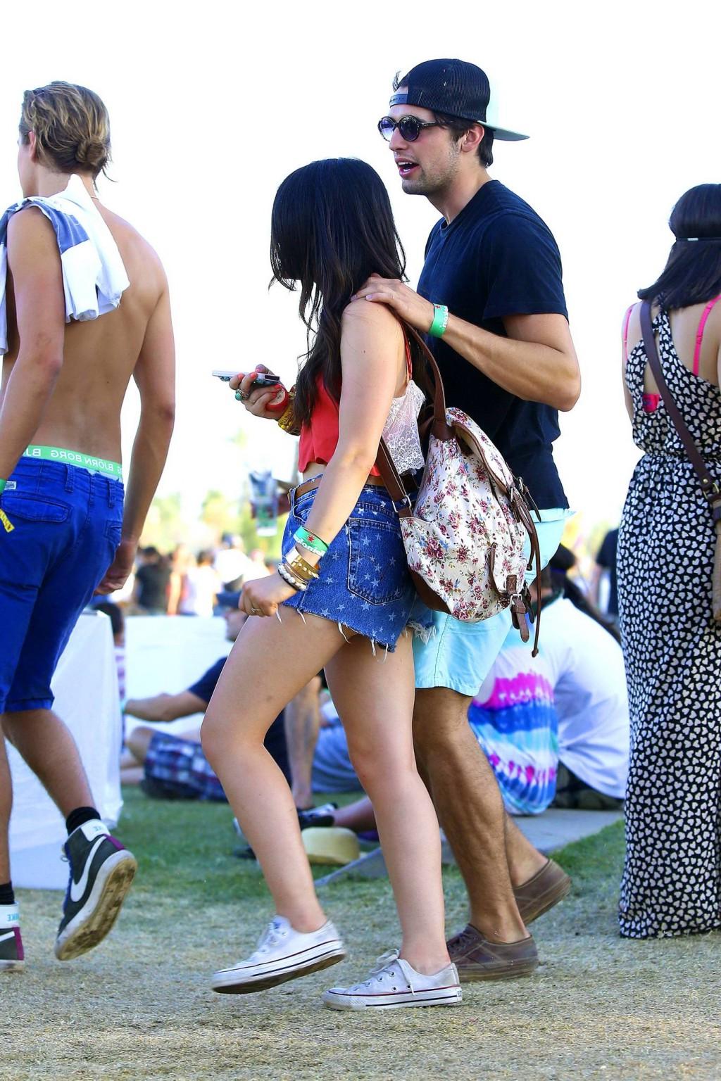 16P Lucy Hale wearing tiny red belly top and denim shorts at 2013 Coachella Music an