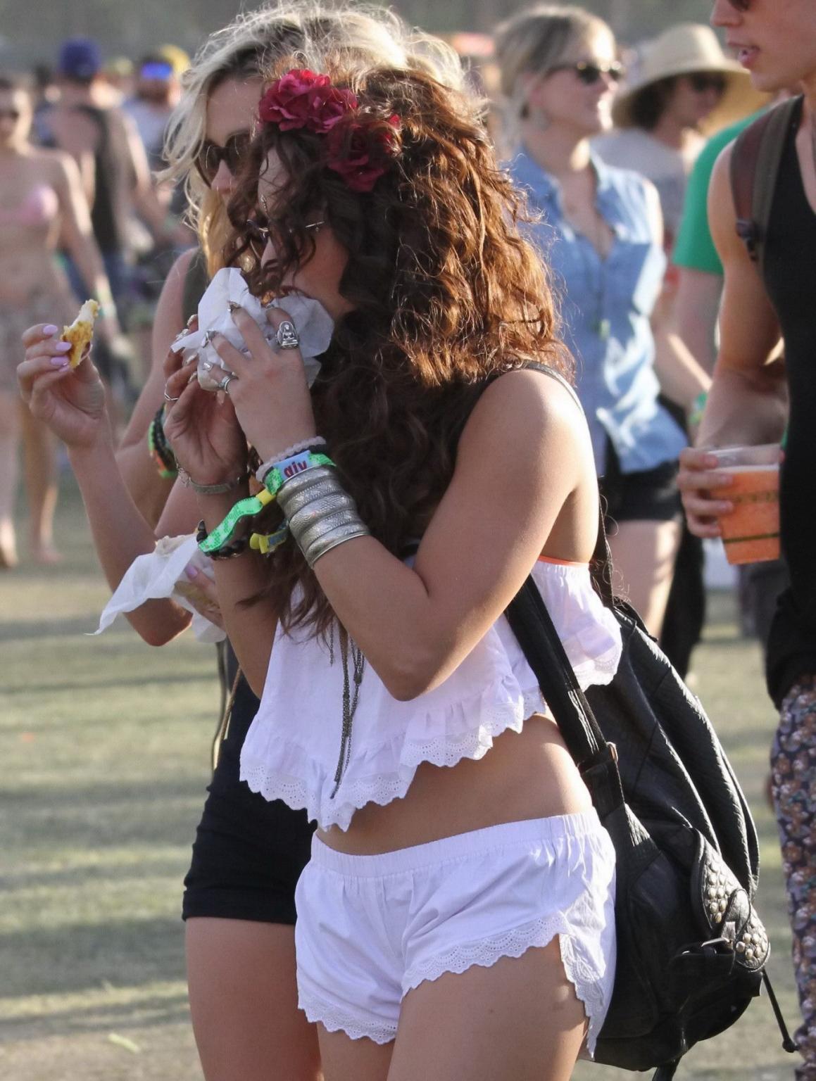 16P Vanessa Hudgens wears tiny white shorts and belly top while eating a burger at 2