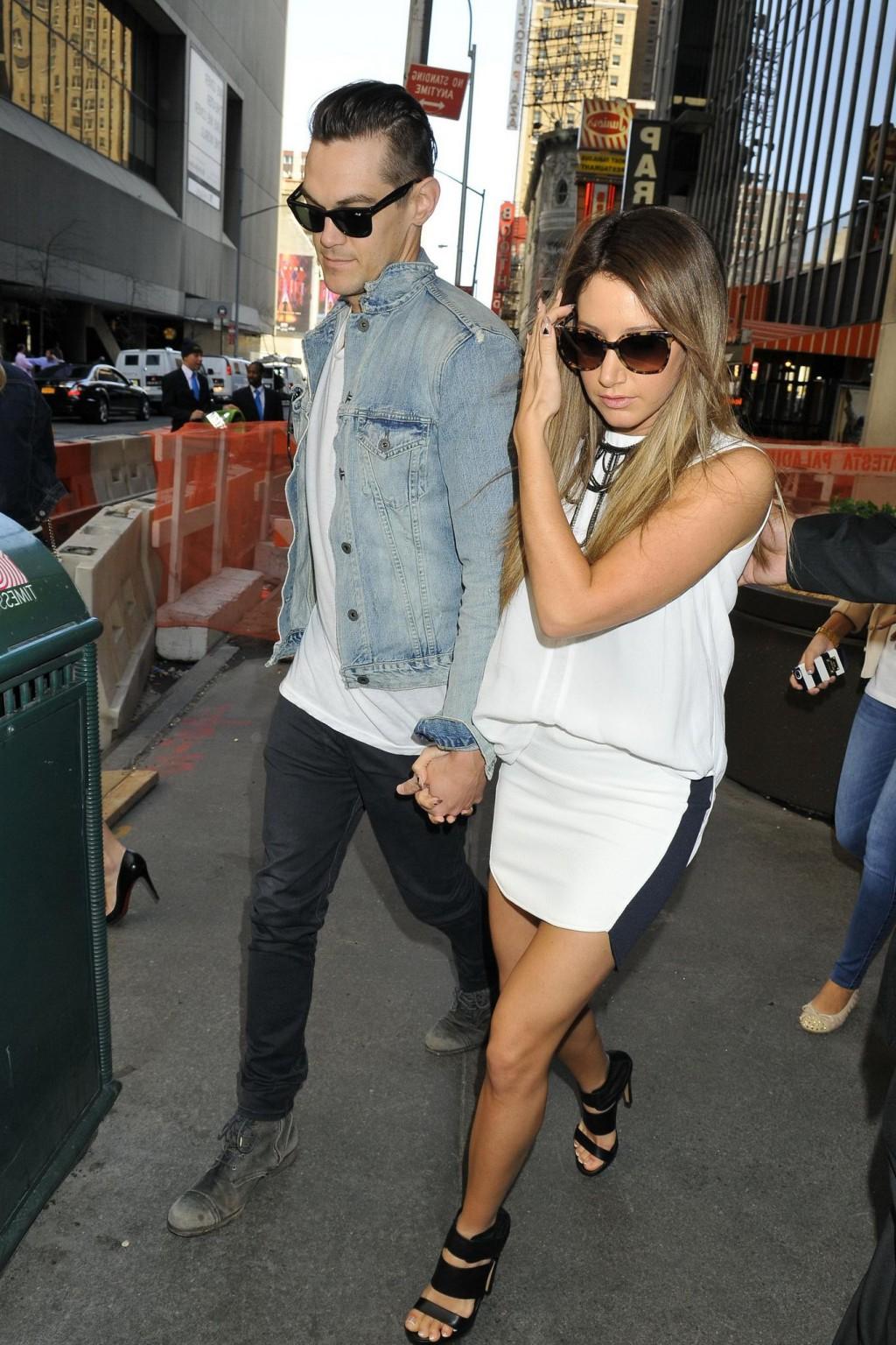 16P Ashley Tisdale leggy wearing a mini skirt outside her hotel in SoHo