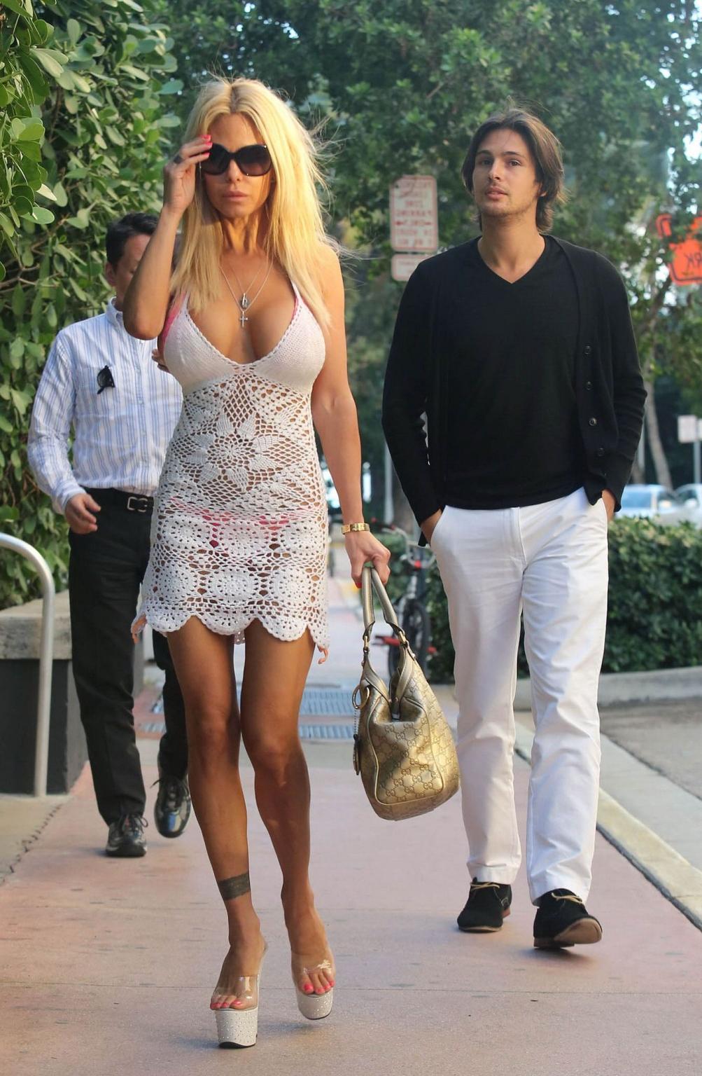 12P Shauna Sand see-through to bikini leaving her hotel in Miami