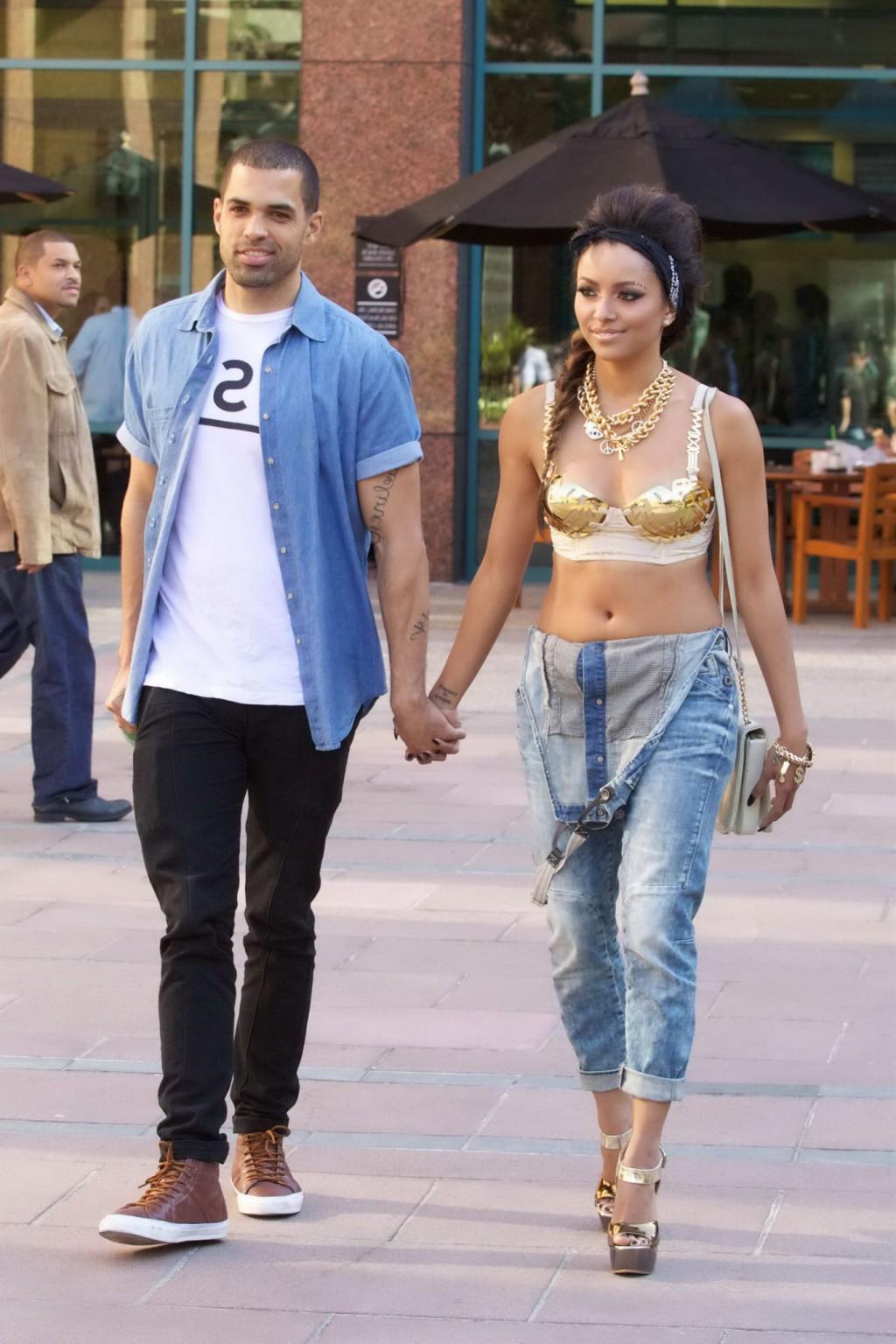 10P Kat Graham exposing her hot body in a belly top  jeans out of the studio in LA