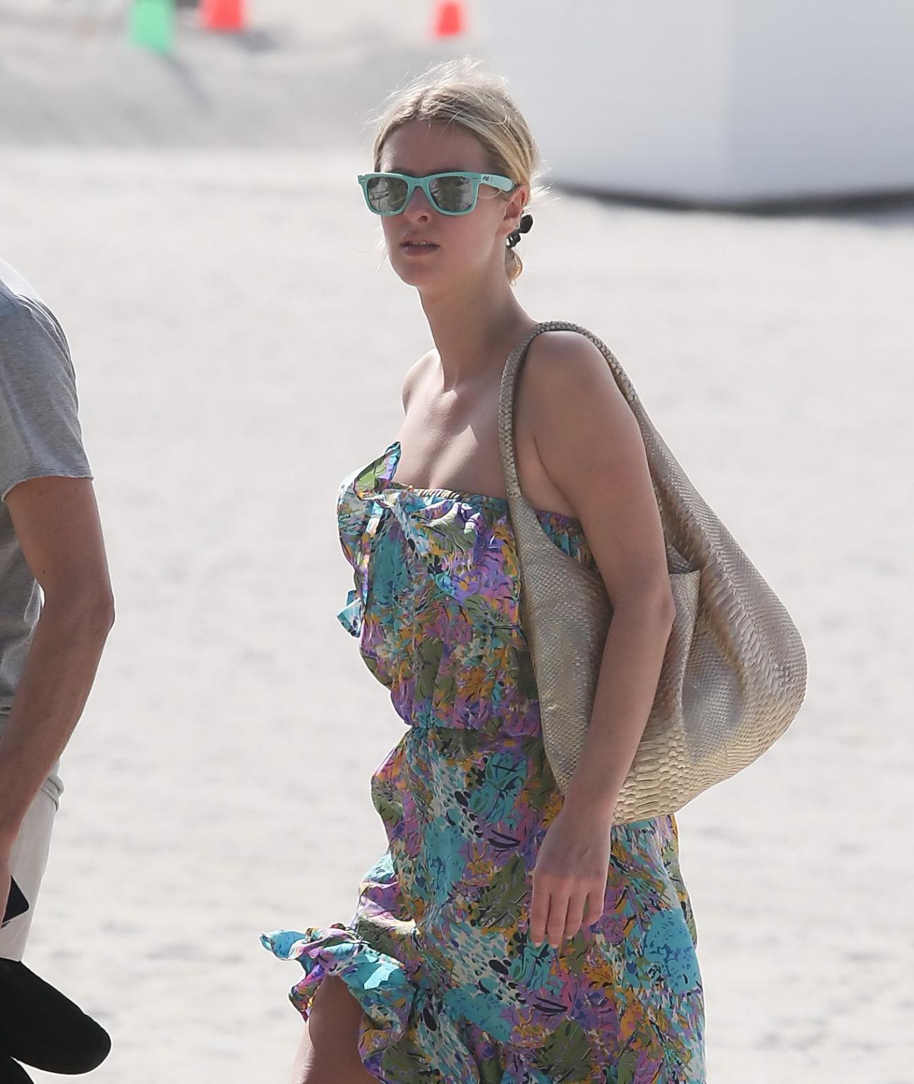 10P Nicky Hilton wearing leopard print bikini at the Delano hotel pool in Miami Beac