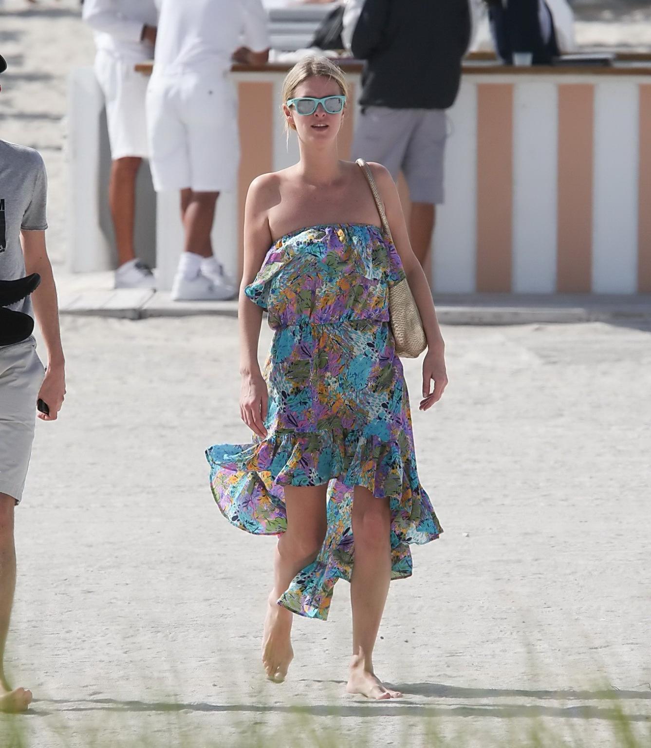 10P Nicky Hilton wearing leopard print bikini at the Delano hotel pool in Miami Beac