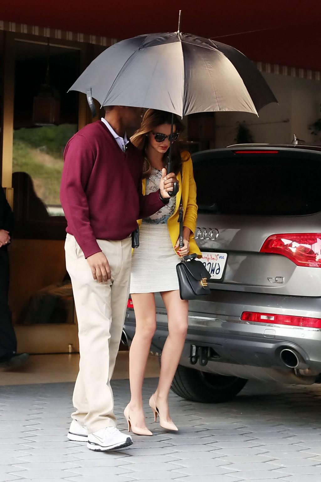 10P Miranda Kerr wearing hot mini skirt while leaving Sunset Tower hotel in West Hol