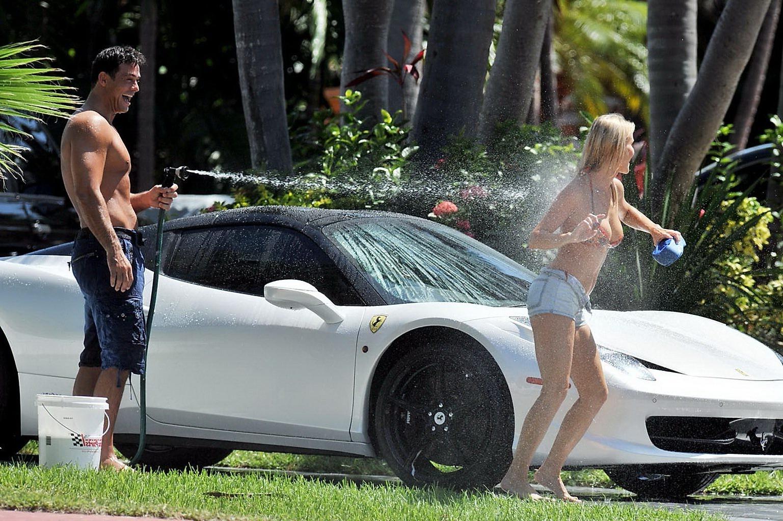10P Joanna Krupa nip slip at the bikini car wash in Miami