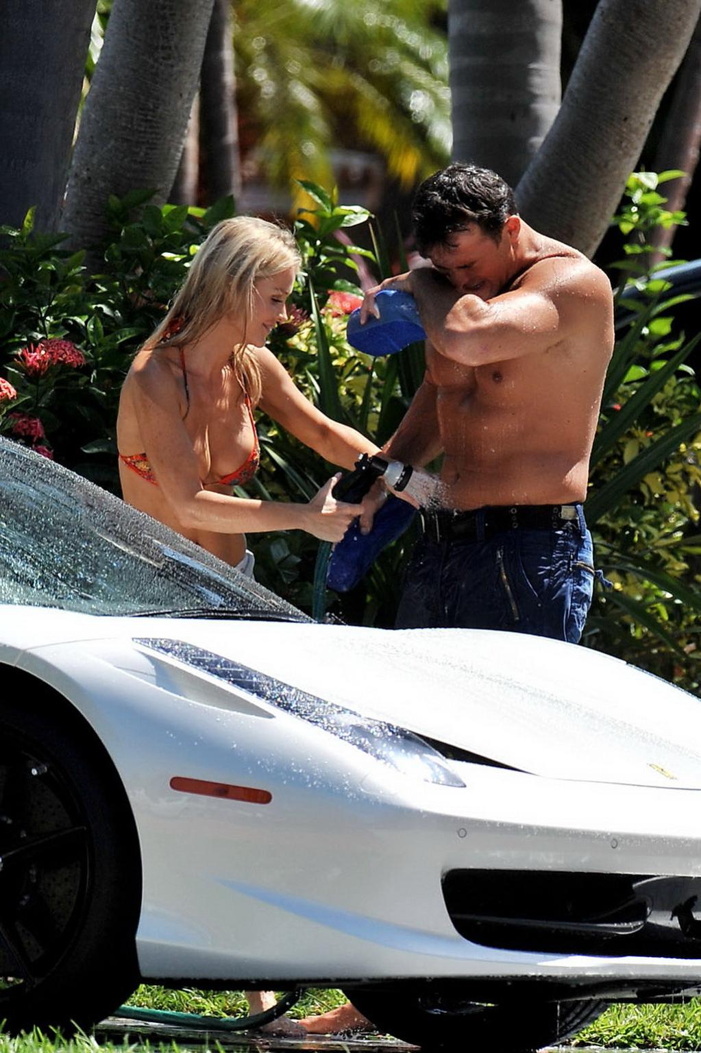 10P Joanna Krupa nip slip at the bikini car wash in Miami