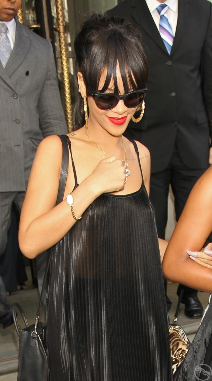 10P Rihanna braless in see through top leaving her hotel in London