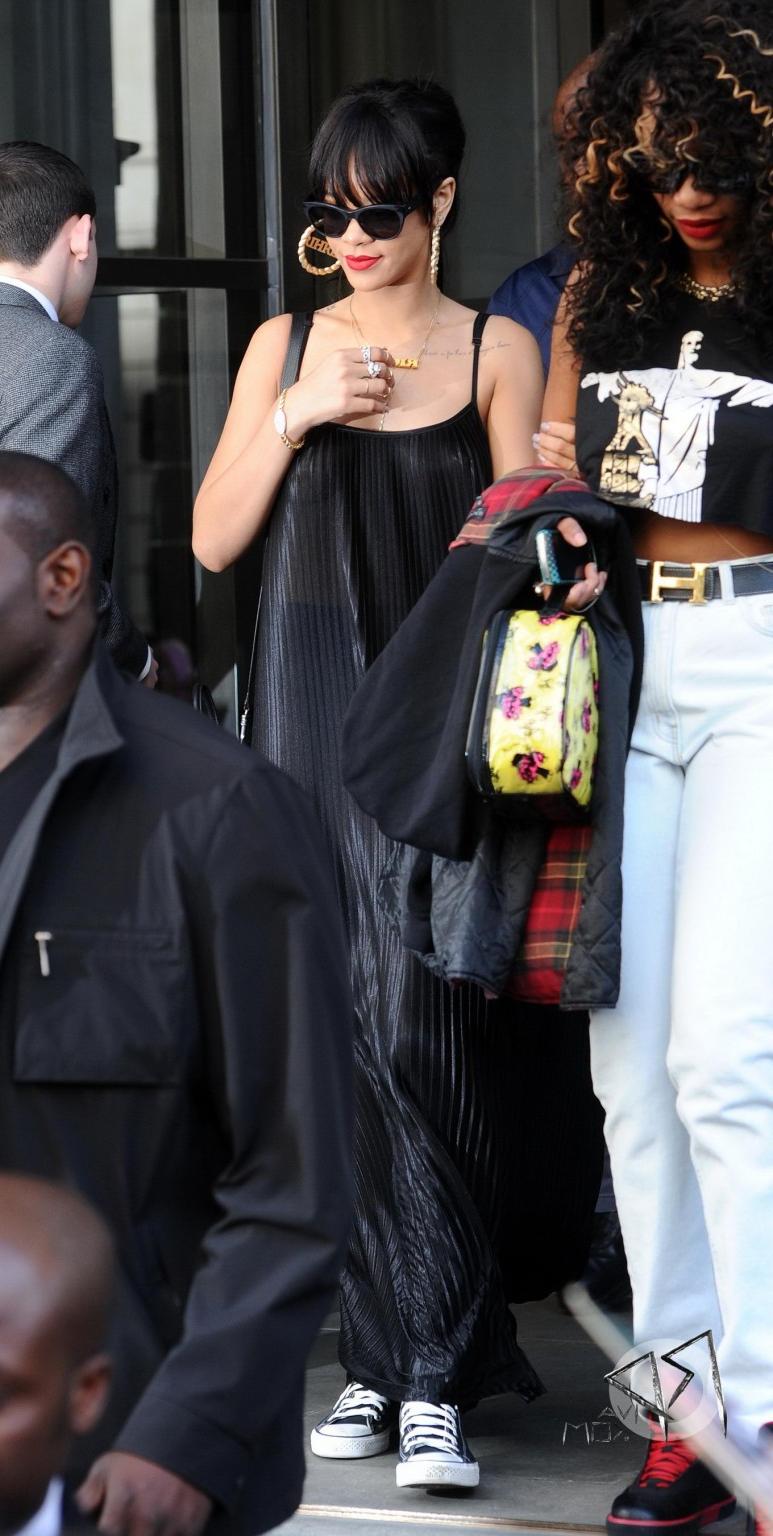10P Rihanna braless in see through top leaving her hotel in London