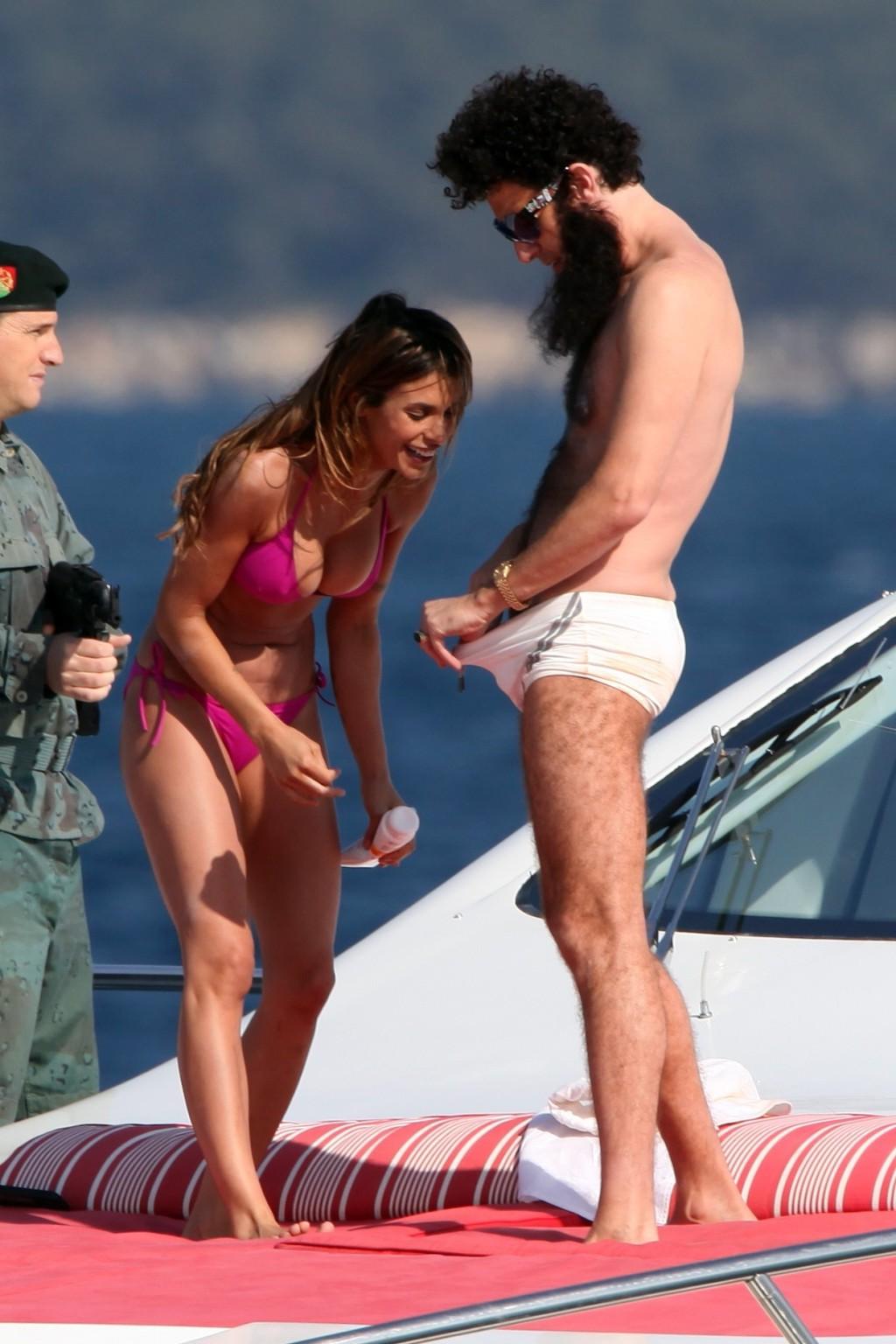 10P Elisabetta Canalis in bikini jerking her boyfriend's cock over his shorts on a y