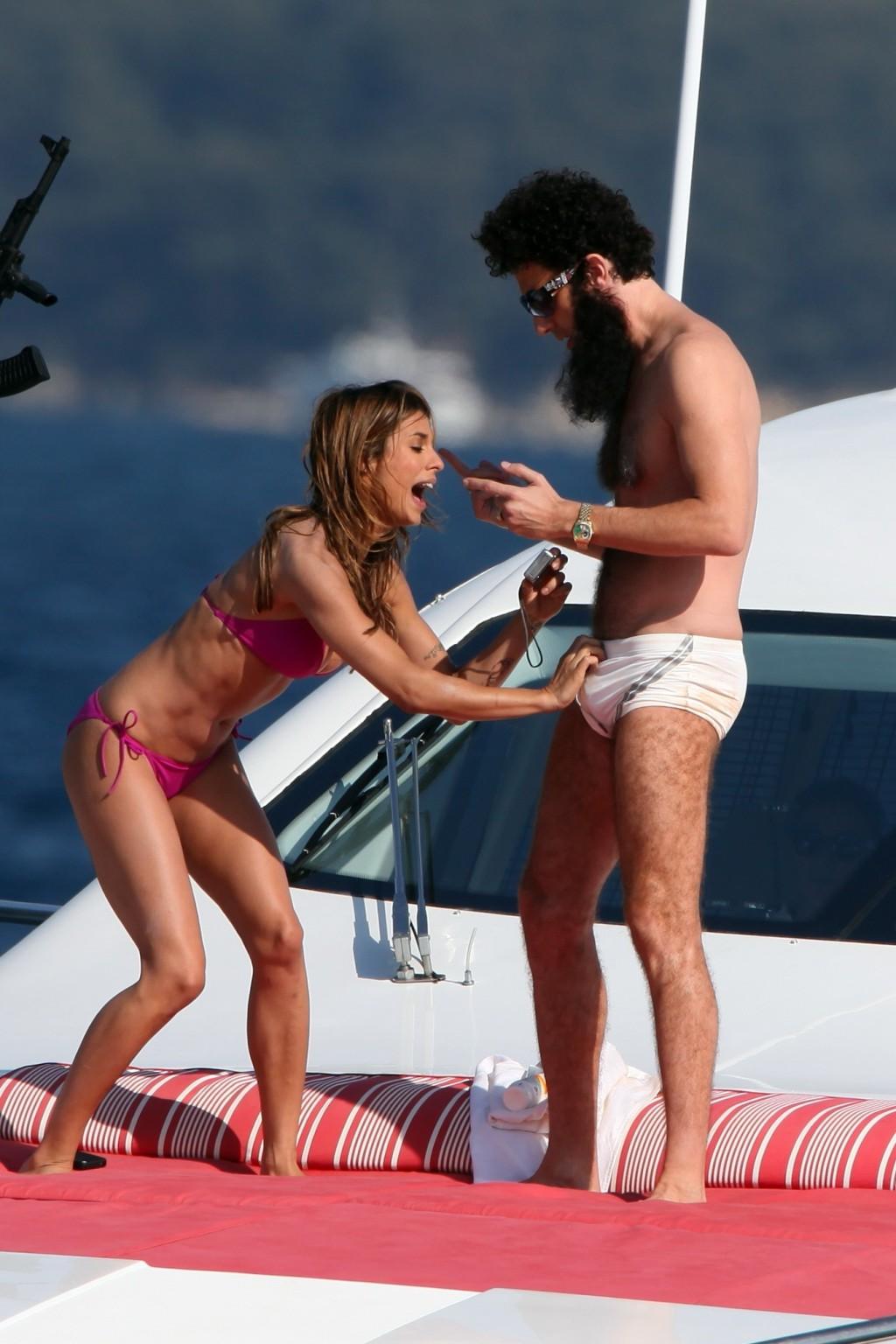 10P Elisabetta Canalis in bikini jerking her boyfriend's cock over his shorts on a y