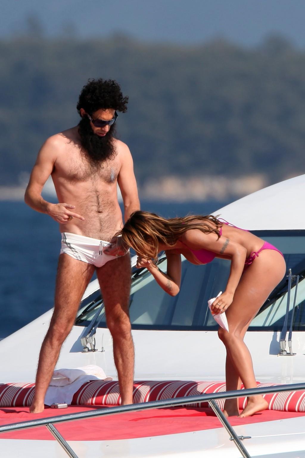 10P Elisabetta Canalis in bikini jerking her boyfriend's cock over his shorts on a y