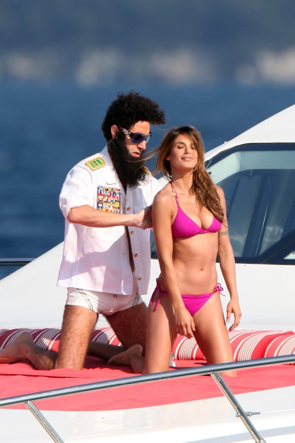 10P Elisabetta Canalis in bikini jerking her boyfriend's cock over his shorts on a y