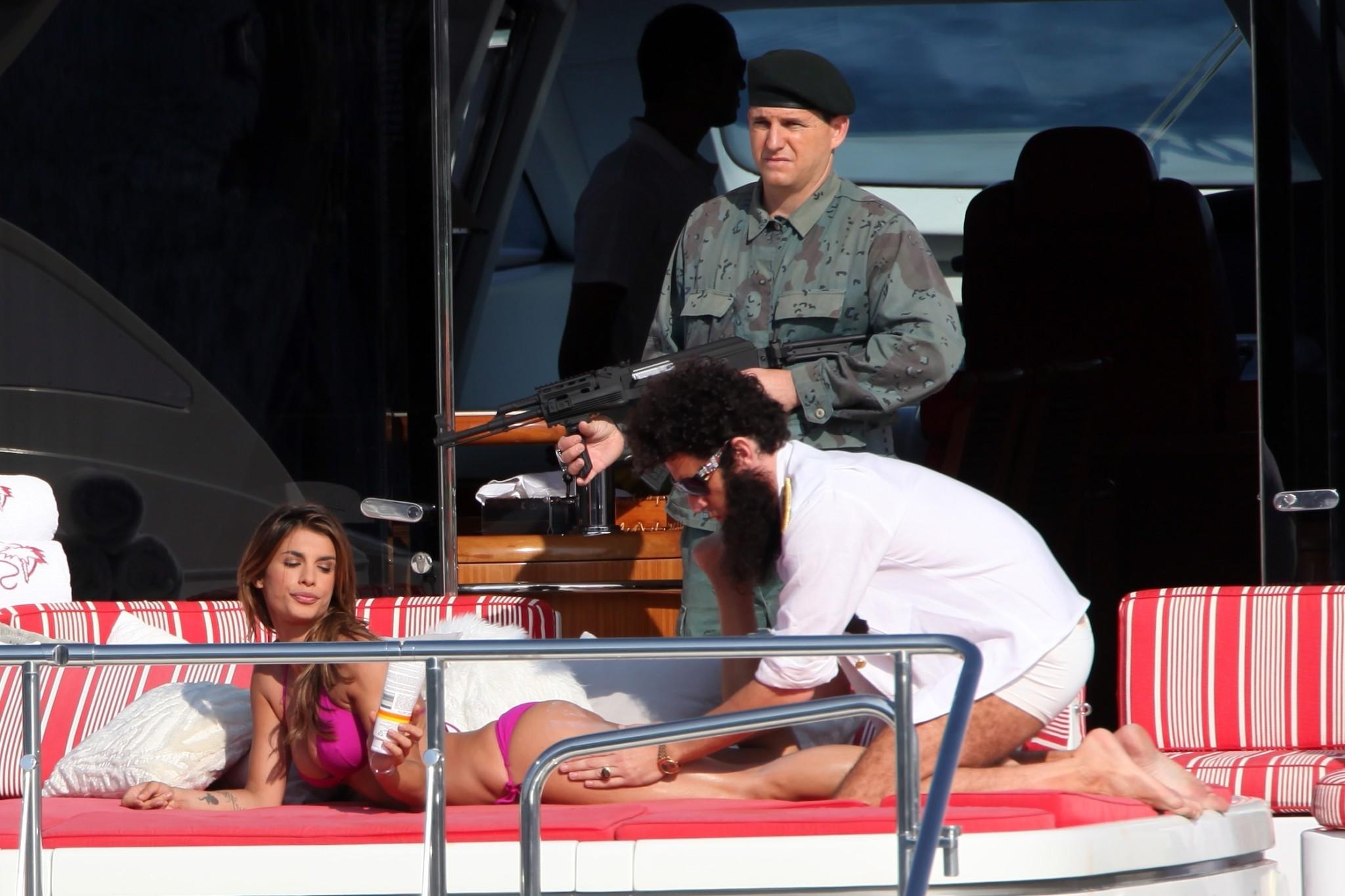 10P Elisabetta Canalis in bikini jerking her boyfriend's cock over his shorts on a y