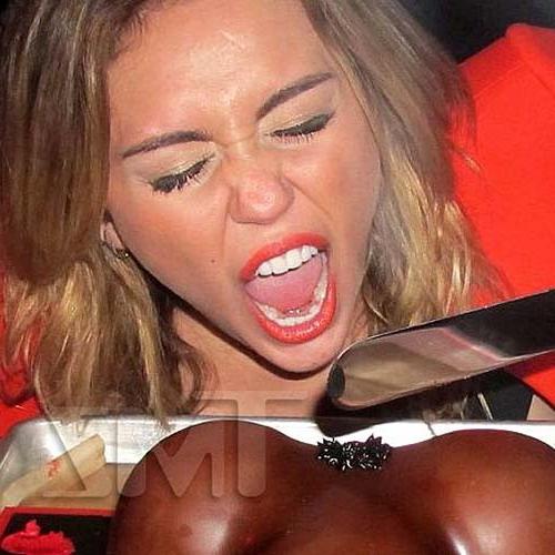 16P Miley Cyrus licking a huge black penis cake at some party