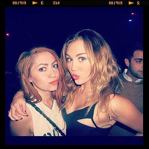 16P Miley Cyrus licking a huge black penis cake at some party