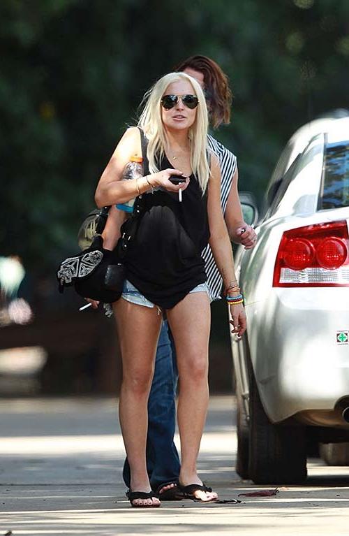 16P Lindsay Lohan spreading her sexy legs at the balconcy of hotel