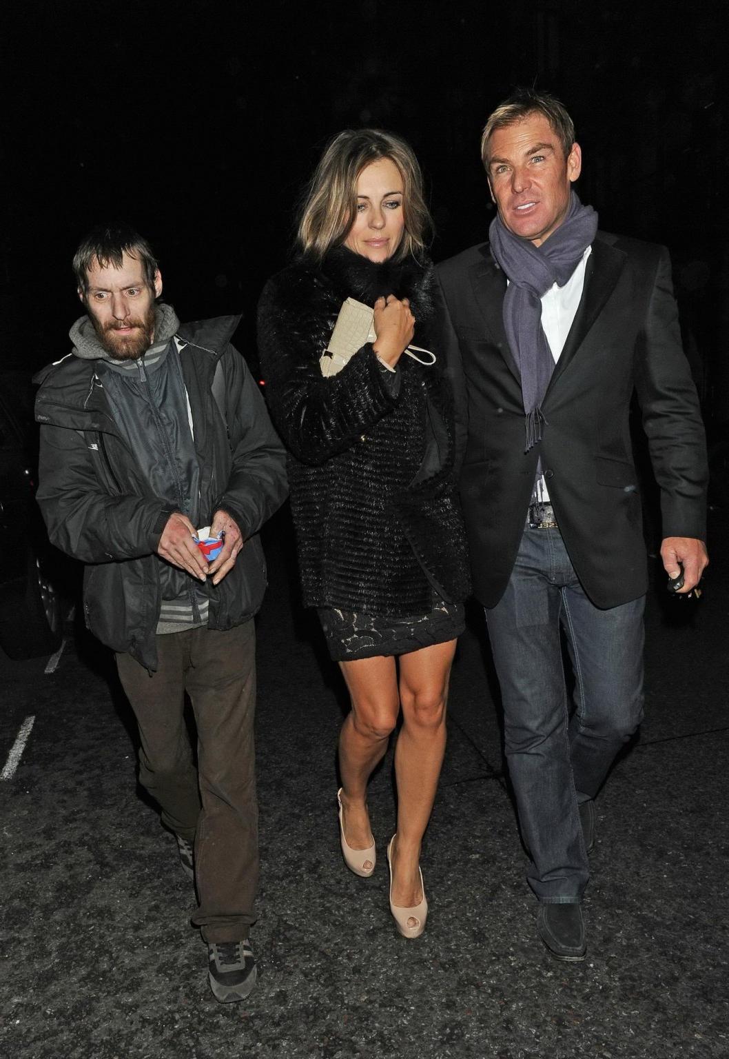 16P Elizabeth Hurley leggy leaving C London Restaurant in Mayfair Hotel