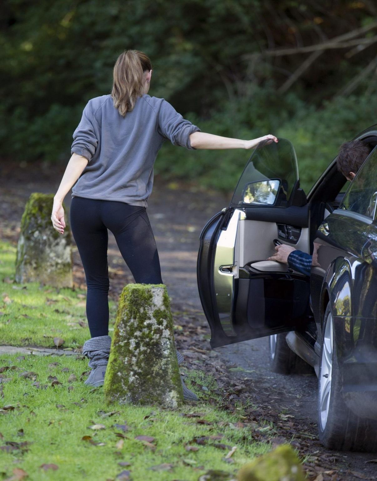16P Kelly Brook showing off her ass in tights outside her home in London