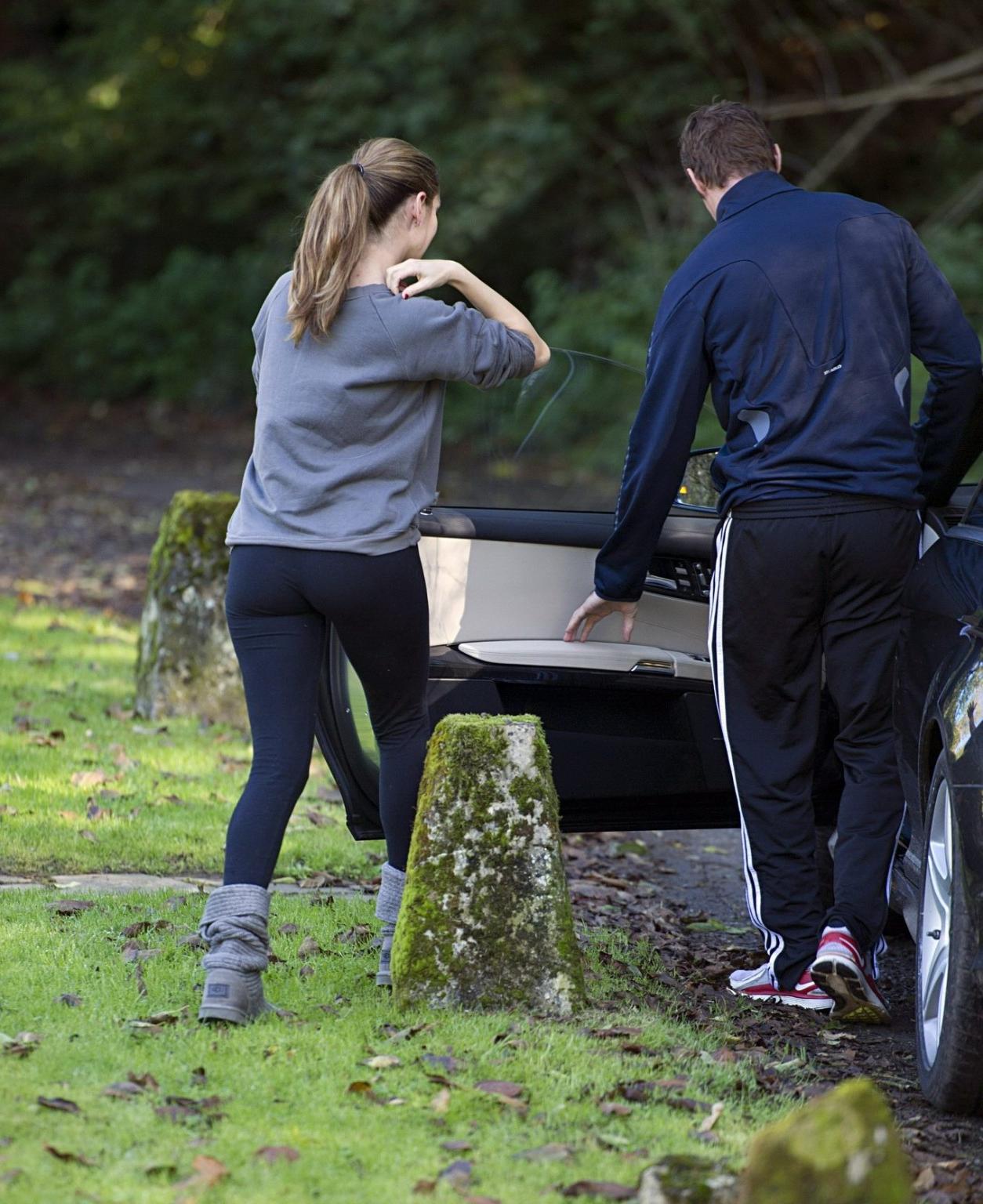 16P Kelly Brook showing off her ass in tights outside her home in London