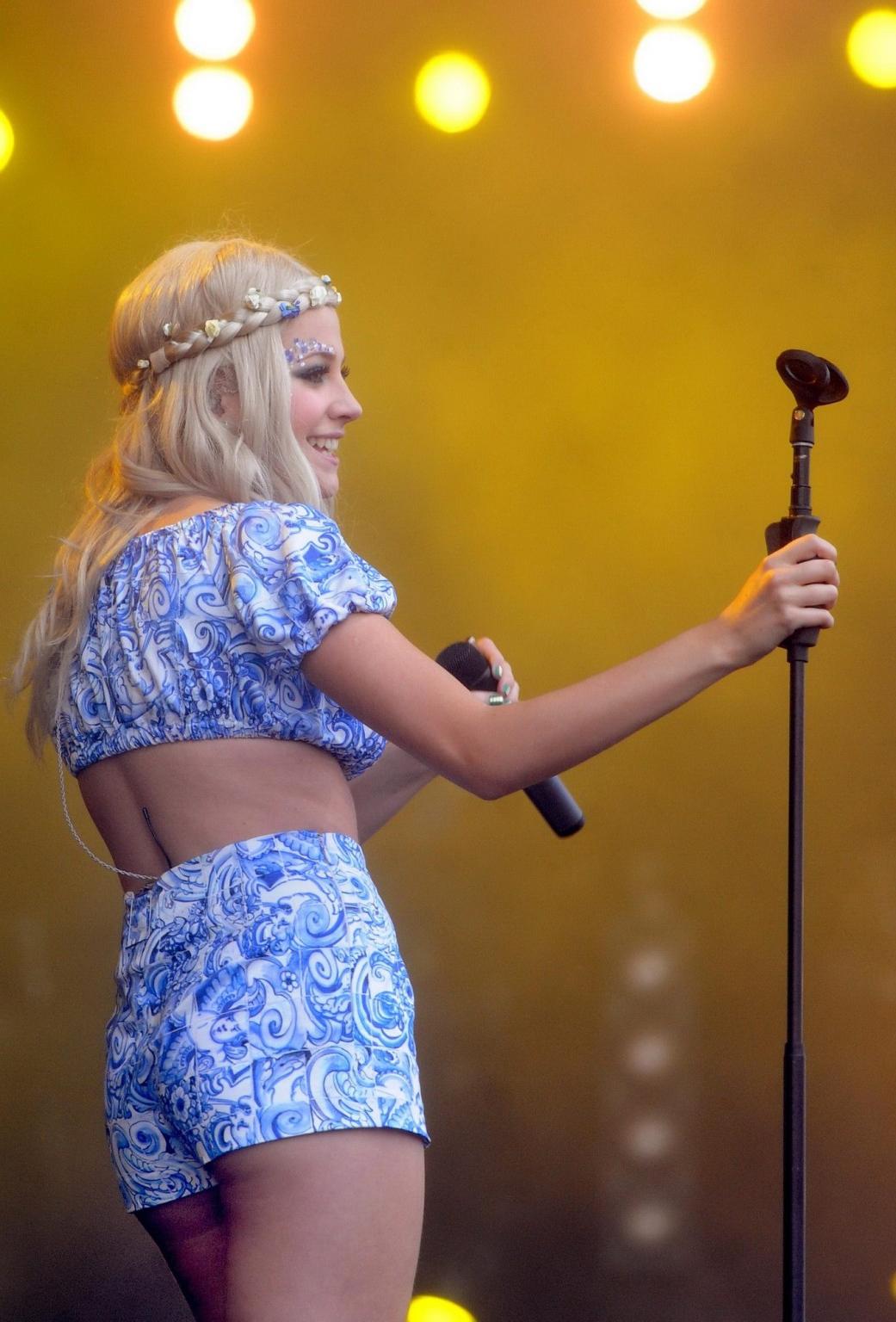 16P Pixie Lott in shorts  belly top performing on the 2011 Isle Of Wight Festival