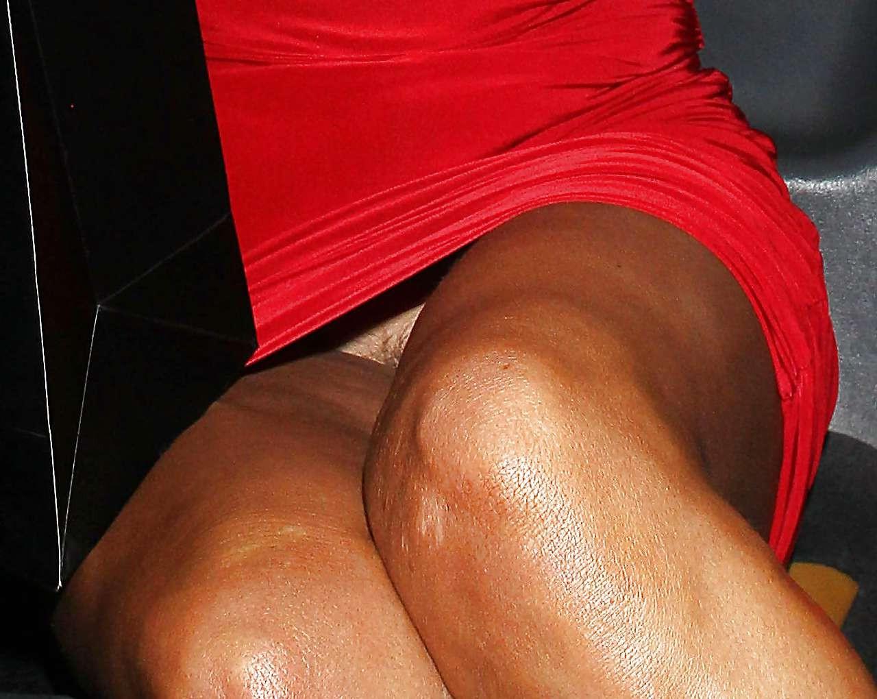 16P Elizabeth Cundy exposing her bare hairy pussy upskirt in car paparazzi pictures