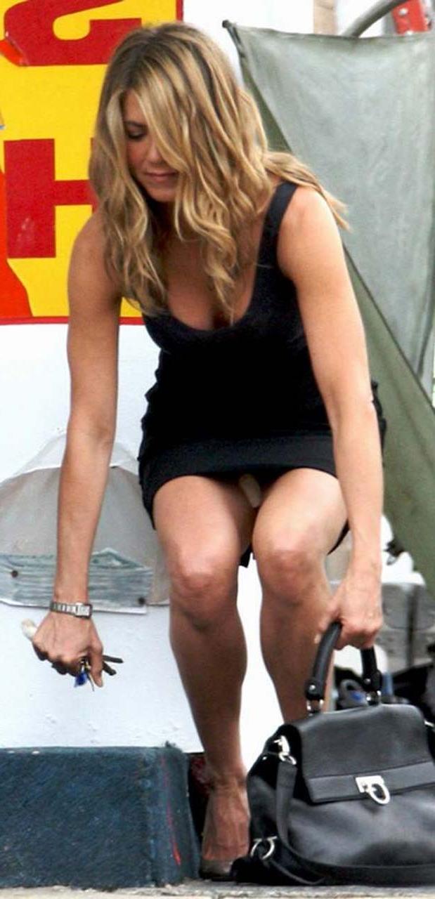 16P Jennifer Aniston flashing her nice boobs in see thru top and upskirt in car papa