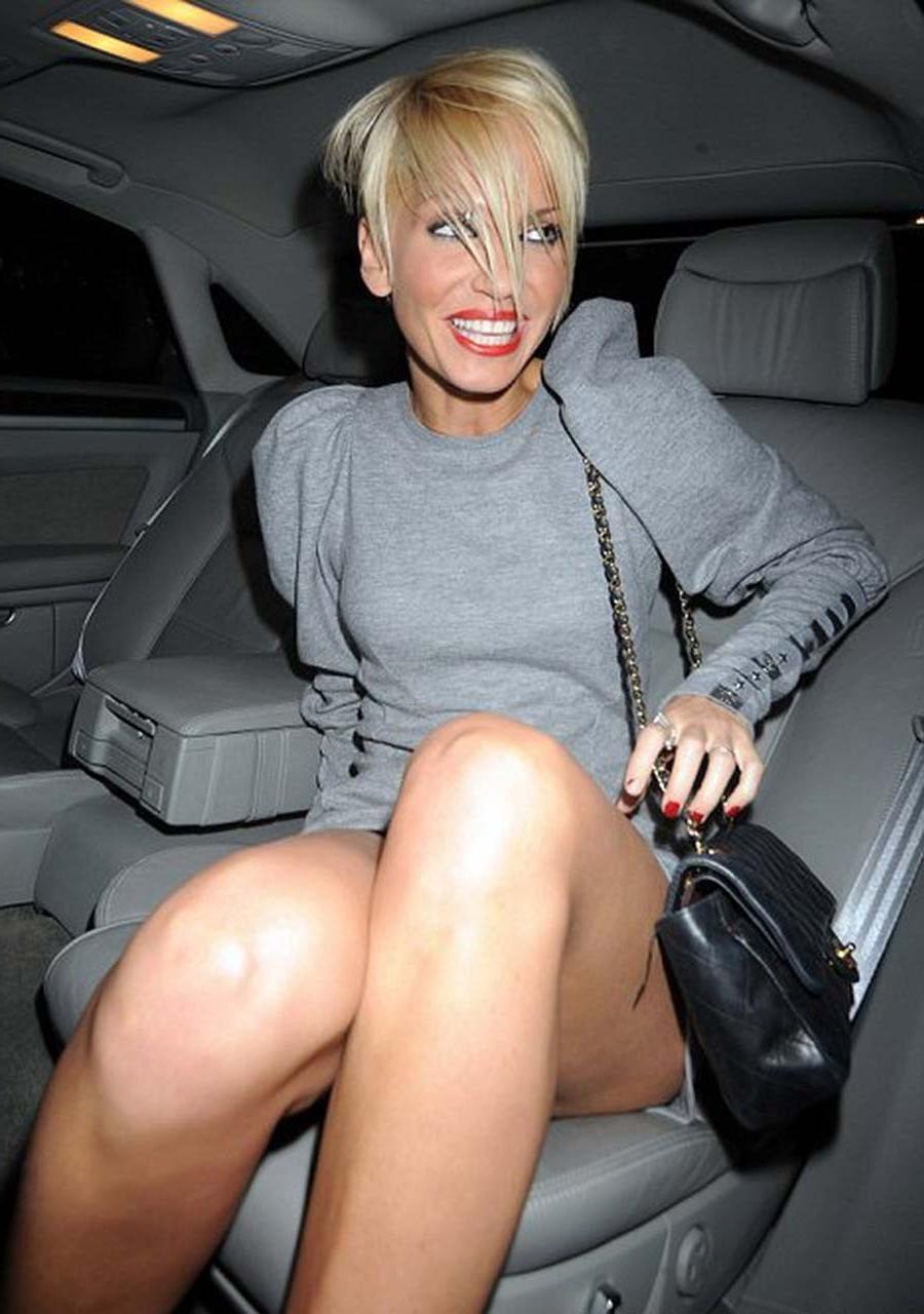 16P Sarah Harding flashing her panties upskirt in car and looking sexy in bikini