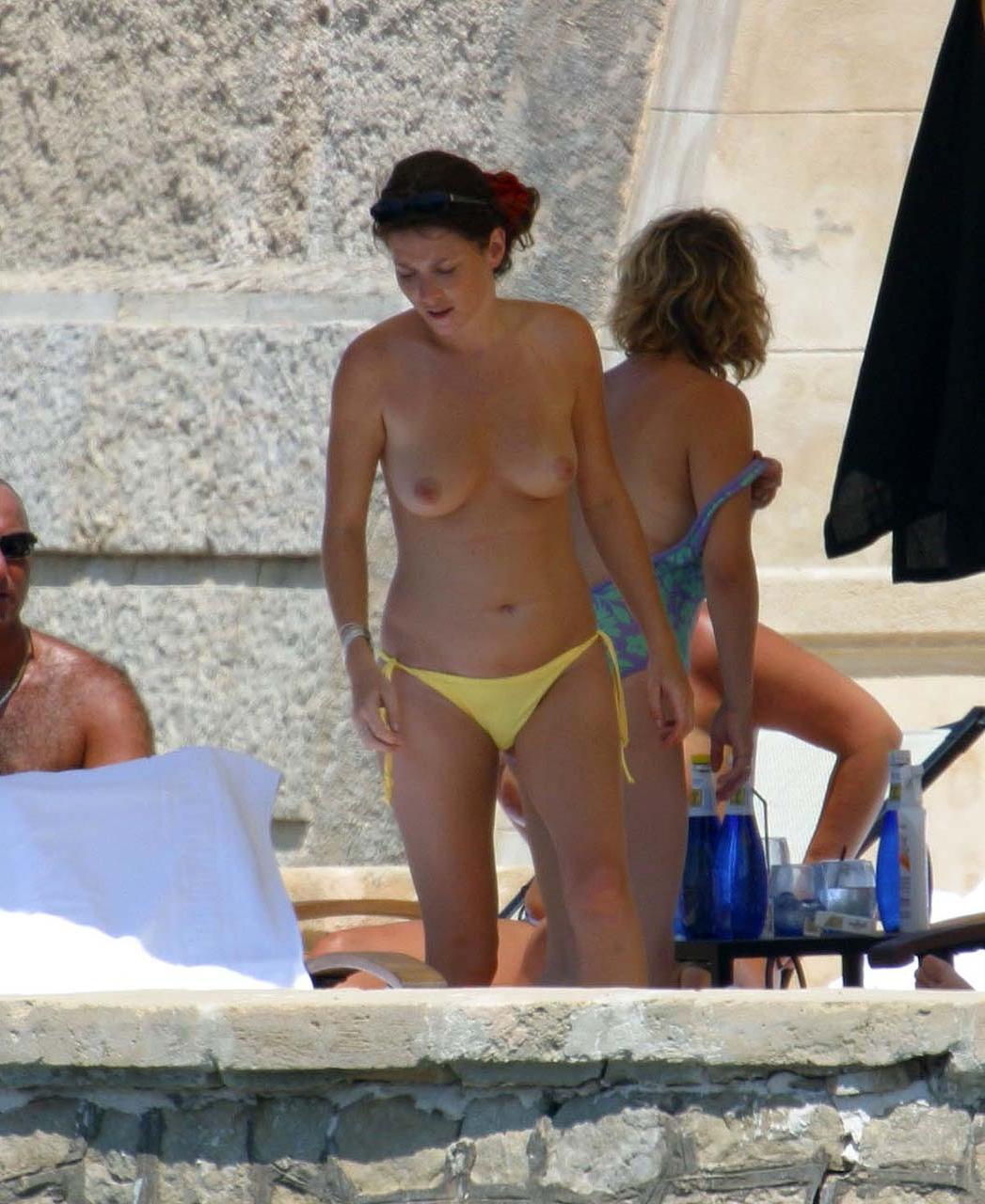 10P Anna Friel showing her nice big boobs and flashing panties upskirt in car