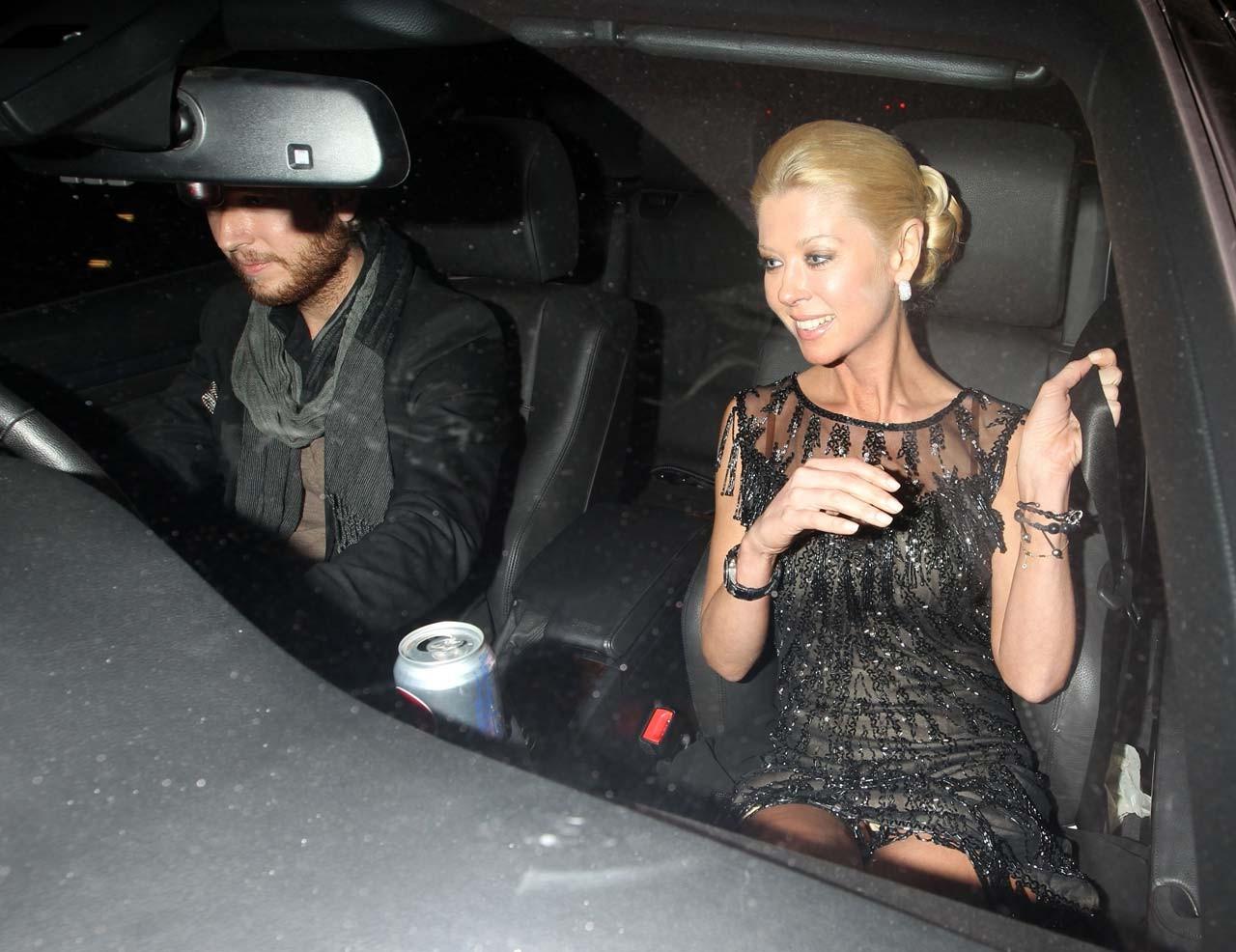 10P Tara Reid flashing her panties upskirt in car and posing sexy in bikini on beach