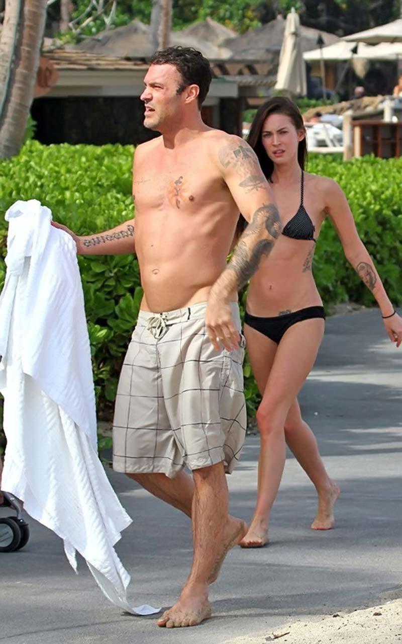 10P Megan Fox showing her great body in black bikini and upskirt in car paparazzi sh