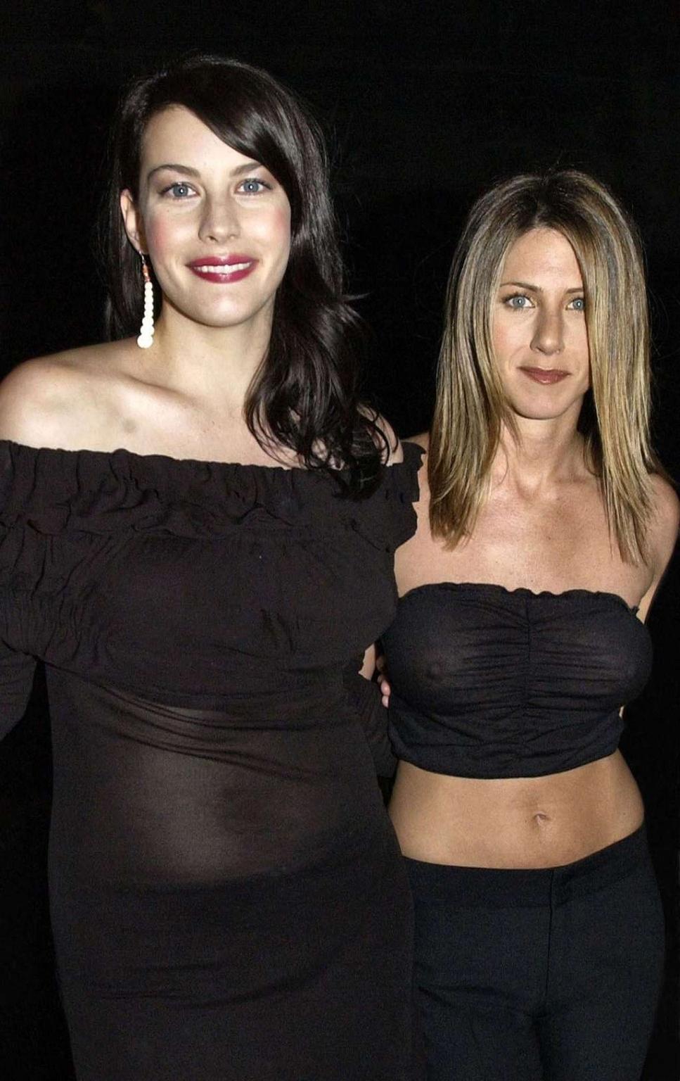 10P Jennifer Aniston showing her nice tits in see thru top and upskirt in car