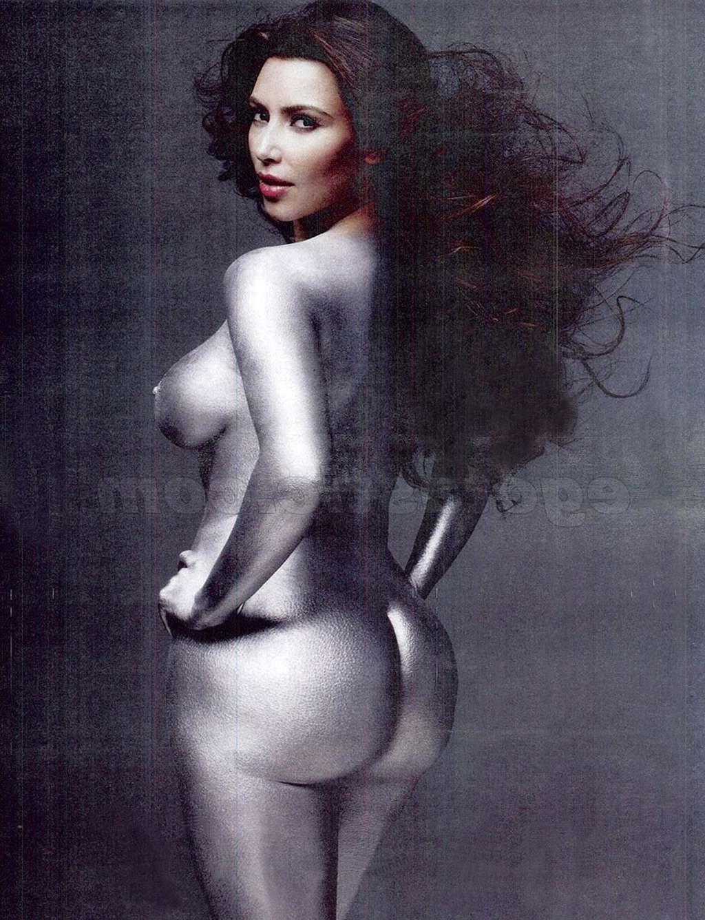 10P Kim Kardashian exposing her nice big boobs and flashing panties upskirt in car