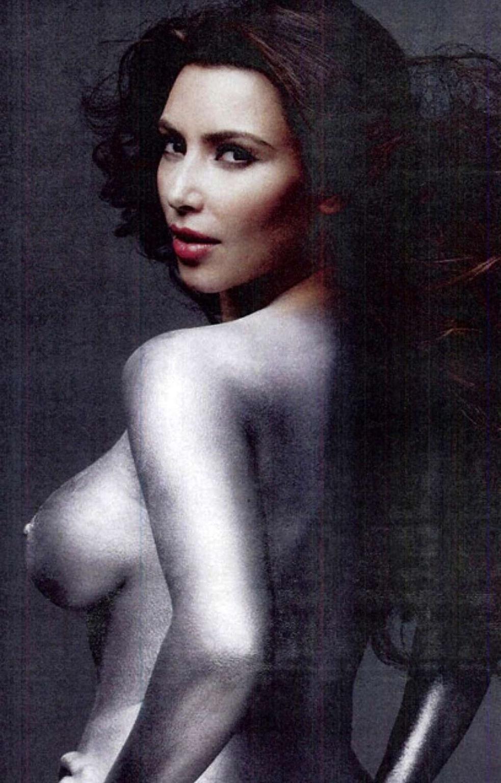 10P Kim Kardashian exposing her nice big boobs and flashing panties upskirt in car