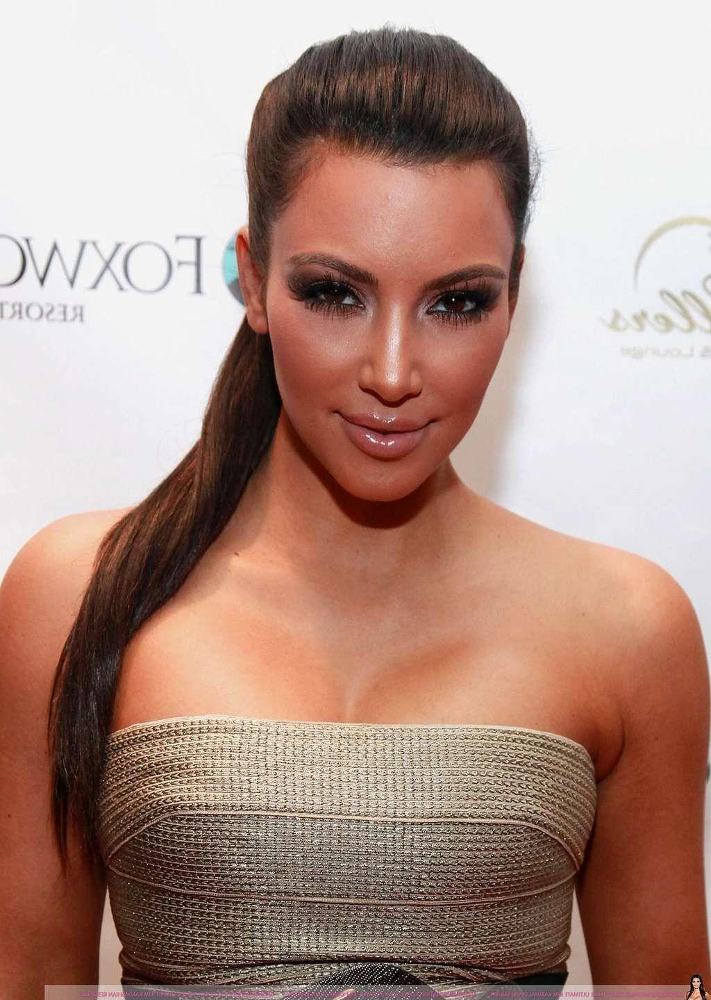10P Kim Kardashian exposing her nice big boobs and flashing panties upskirt in car