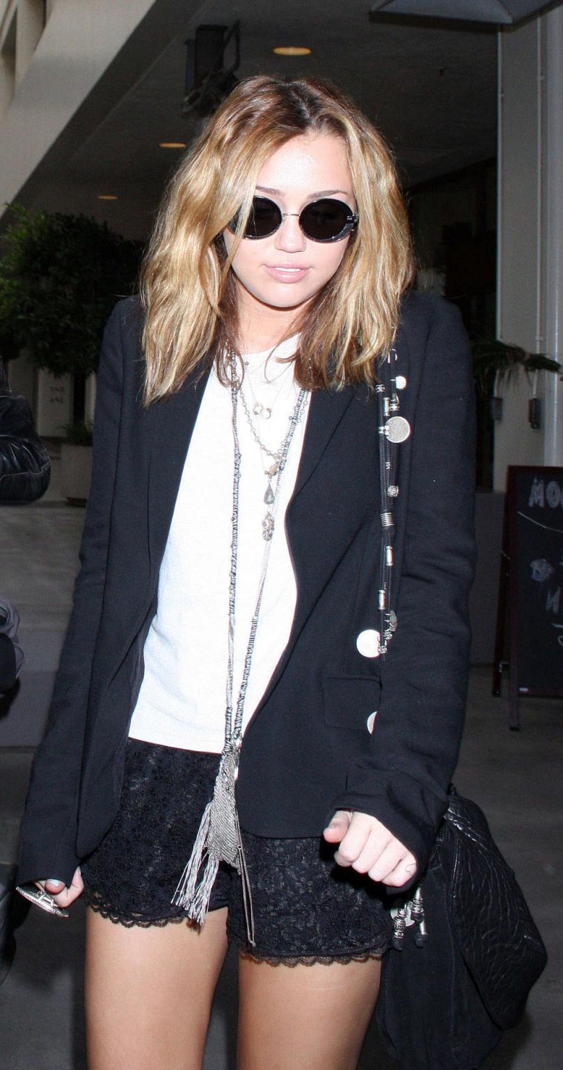 16P Miley Cyrus exposing sexy body and hot legs while she leaving out of the hotel