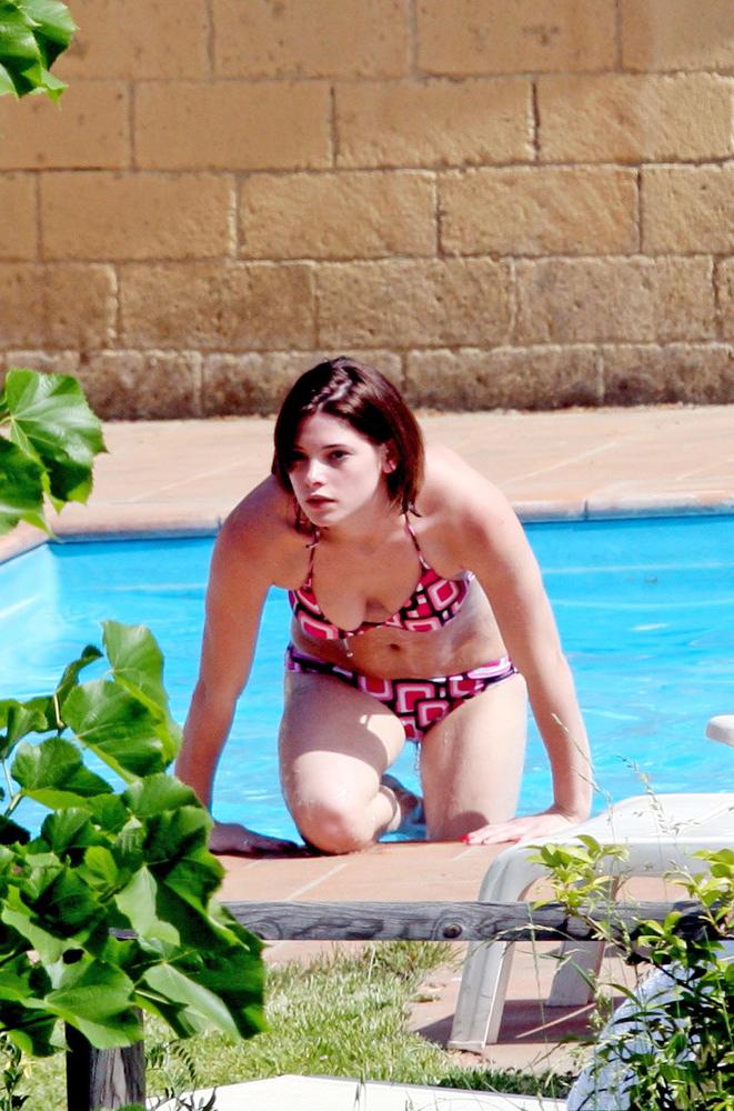 15P Ashley Greene upskirt in a car and sexy in bikini