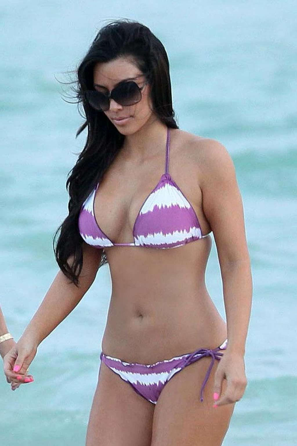 10P Kim Kardashian upskirt in car in mini skirt paparazzi shoots and exposing her as