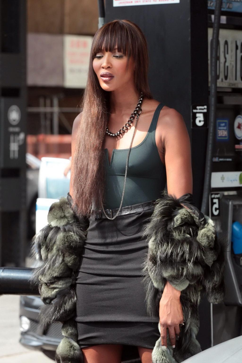 16P Naomi Campbell in teddie  fur coat showing pokies at the photoshoot in NYC
