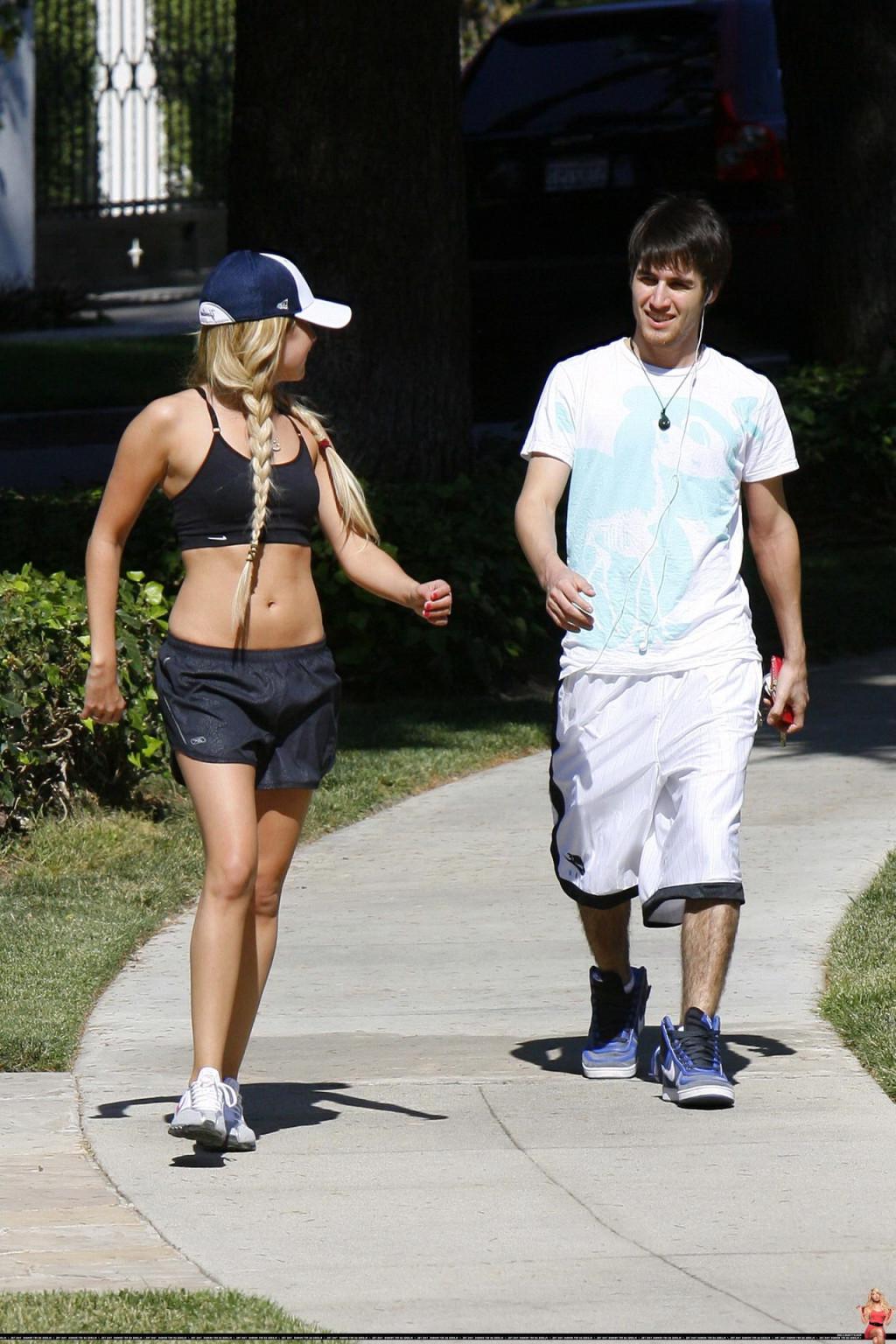 16P Ashley Tisdale shows off her sexy body while jogging in belly shirt and shorts