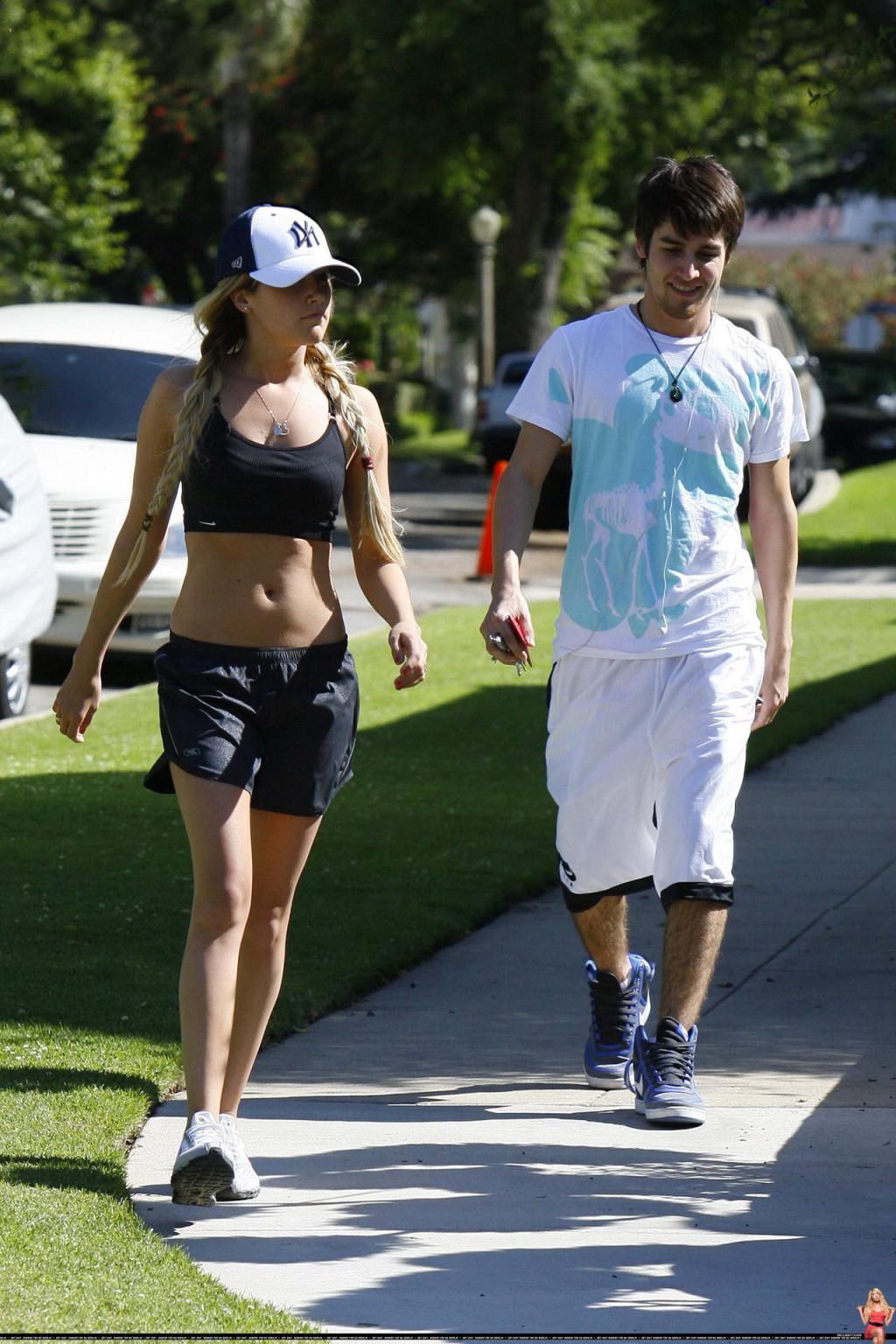 16P Ashley Tisdale shows off her sexy body while jogging in belly shirt and shorts