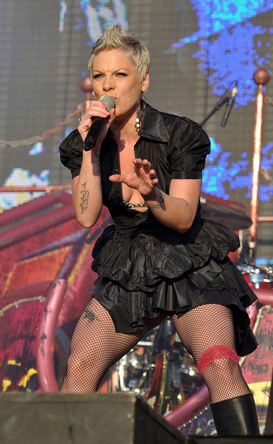 16P Pink in mini dress and fishnet stockings on stage and upskirt in car