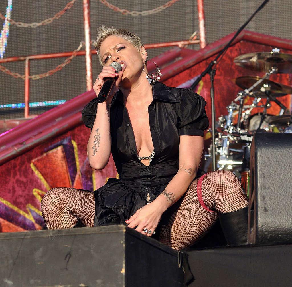 16P Pink in mini dress and fishnet stockings on stage and upskirt in car