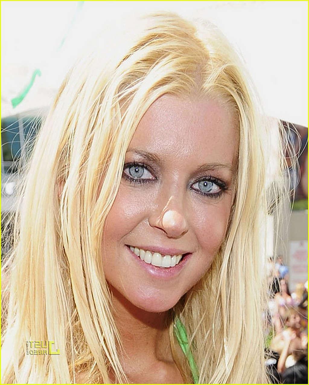 16P Tara Reid showing her panties upskirt in car paparazzi shoots