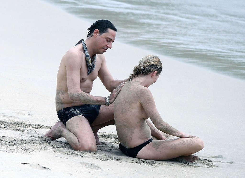 10P Kate Moss tits exposed on beach and upskirt in car paparazzi shoots