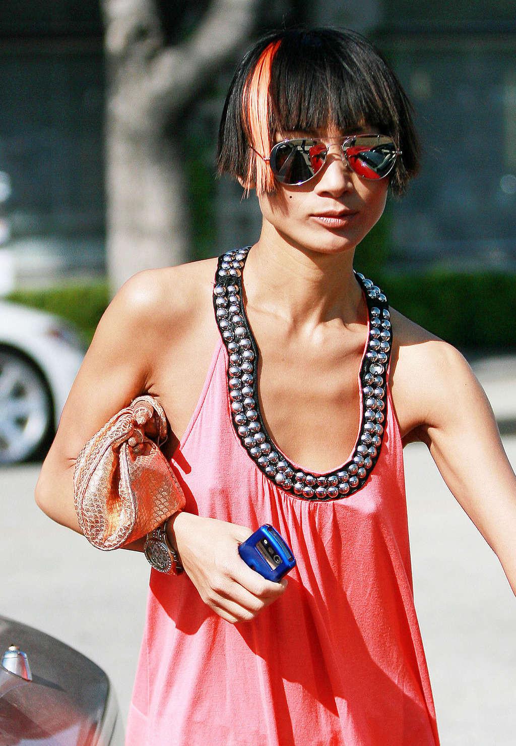 10P Bai Ling nipple slip by the car in public paparazzi shoots