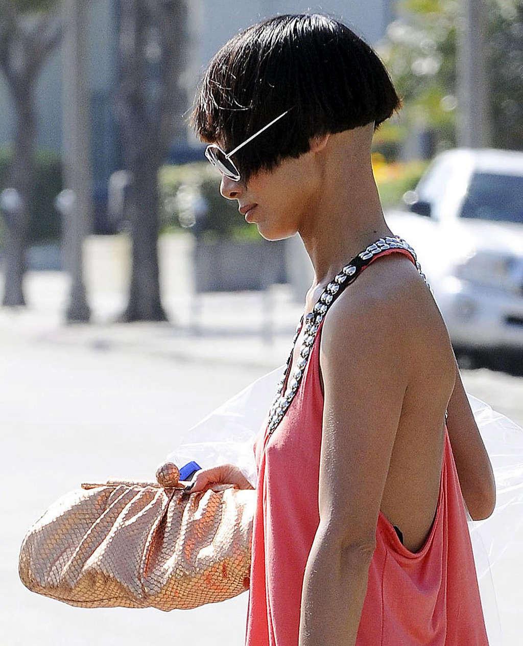 10P Bai Ling nipple slip by the car in public paparazzi shoots