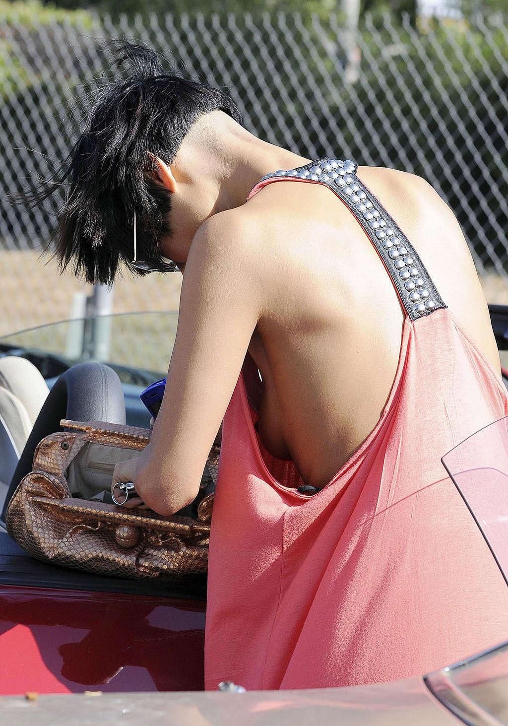 10P Bai Ling nipple slip by the car in public paparazzi shoots