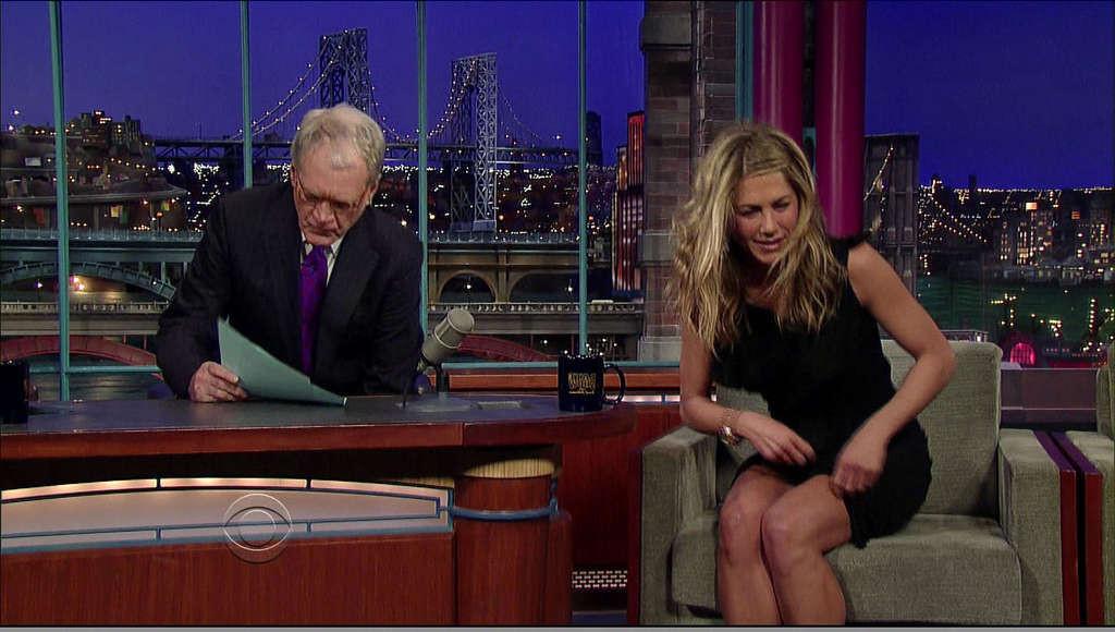 16P Jennifer Aniston showing her great legs in mini skirt on tv show