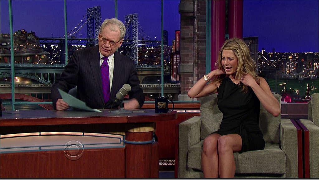 16P Jennifer Aniston showing her great legs in mini skirt on tv show